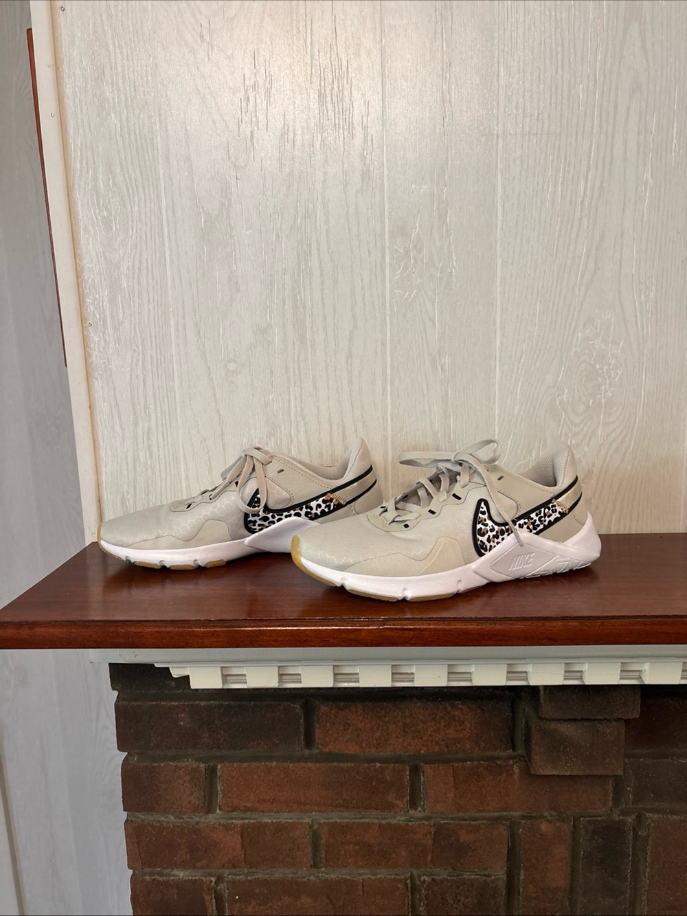 Nike Women’s Light Beige Sneakers with Leopard Swoosh